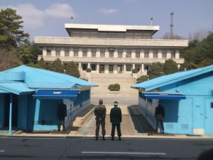 Looking into North Korea. You can see a North Korea guard on the steps in the background.